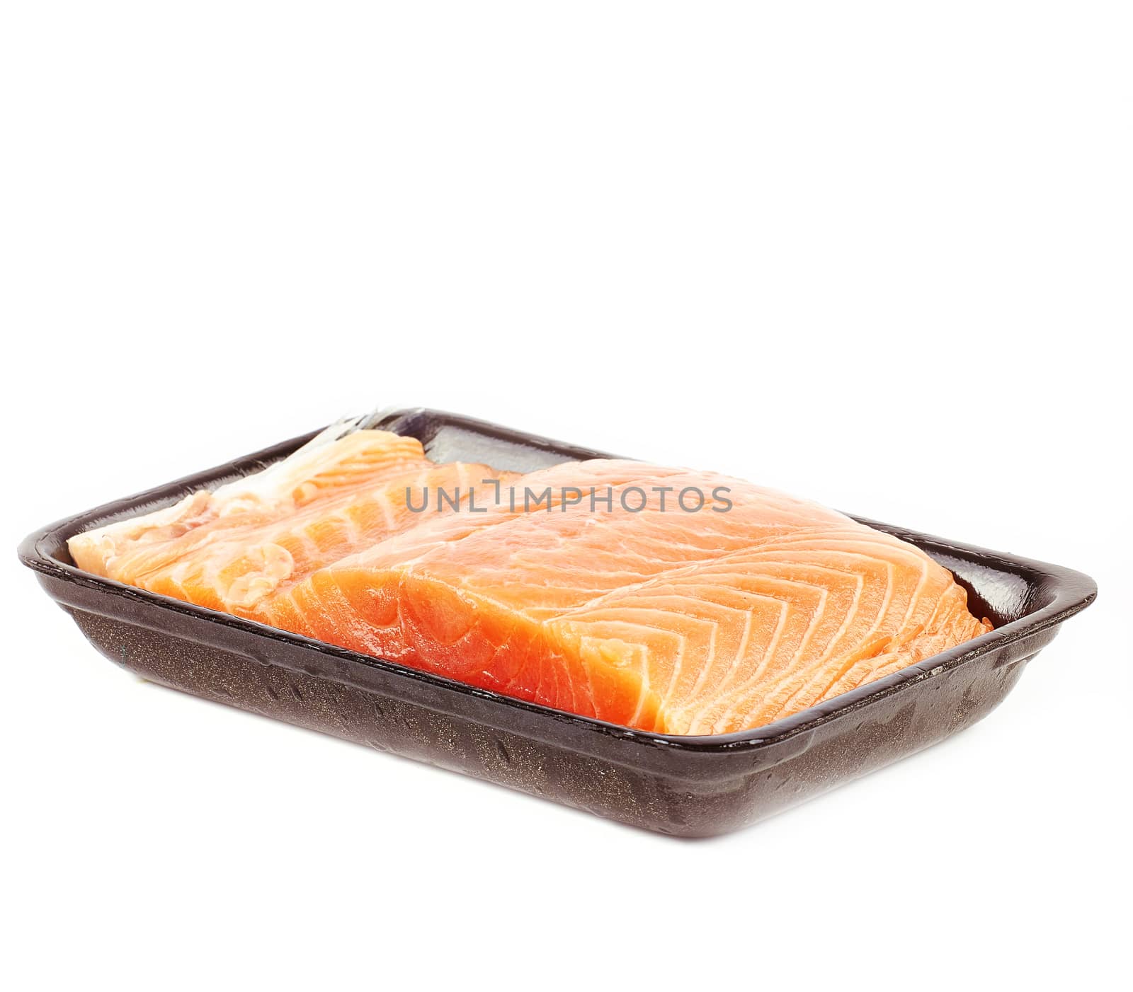 salmon steak red fish on plastic packet
