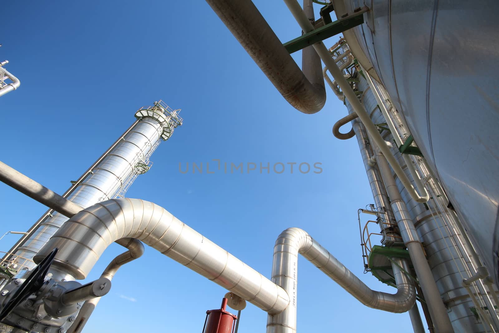 Refinery tower in petrochemical plant with blue sky 