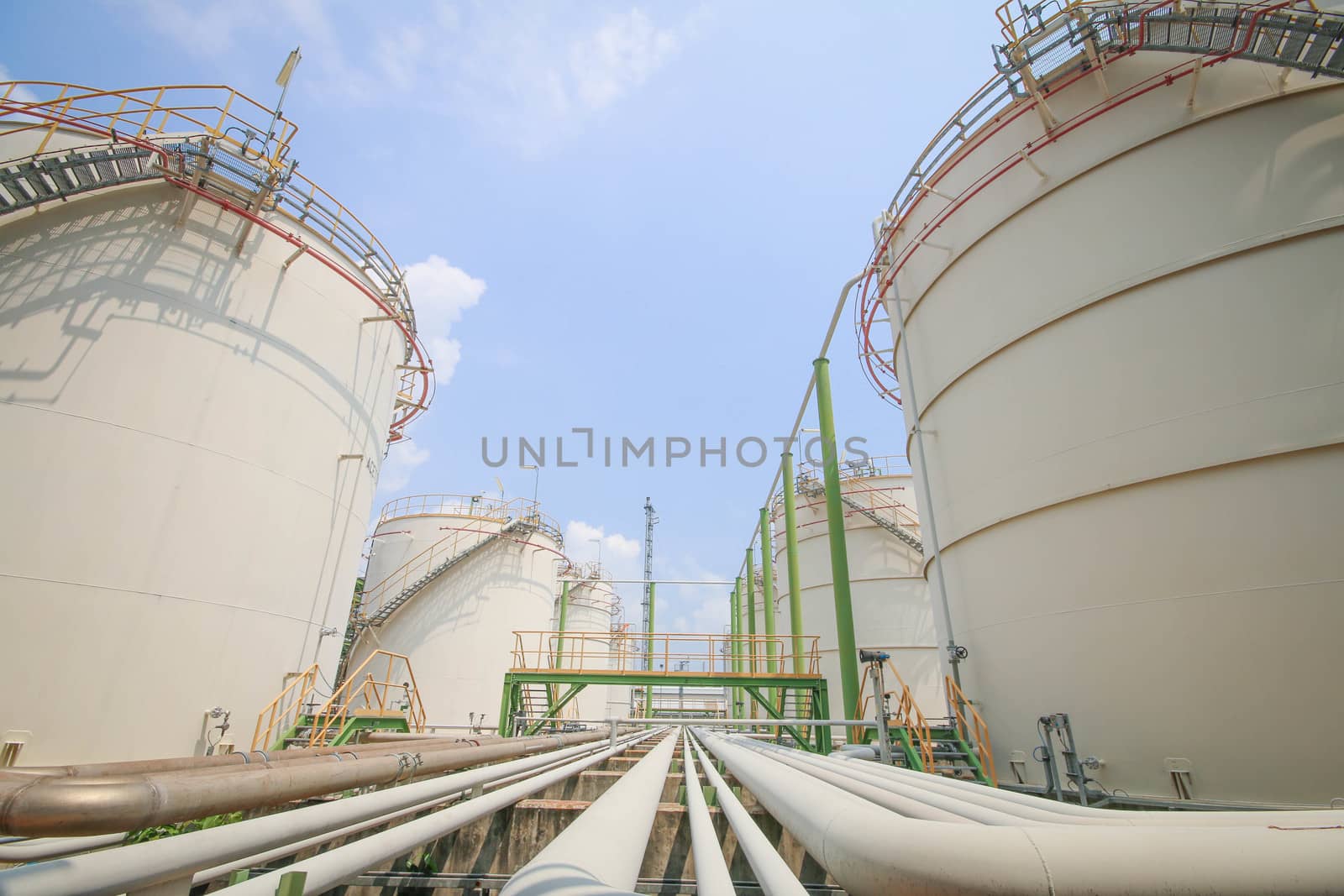 Tank storage in chemical factory with blue sky in summer day 