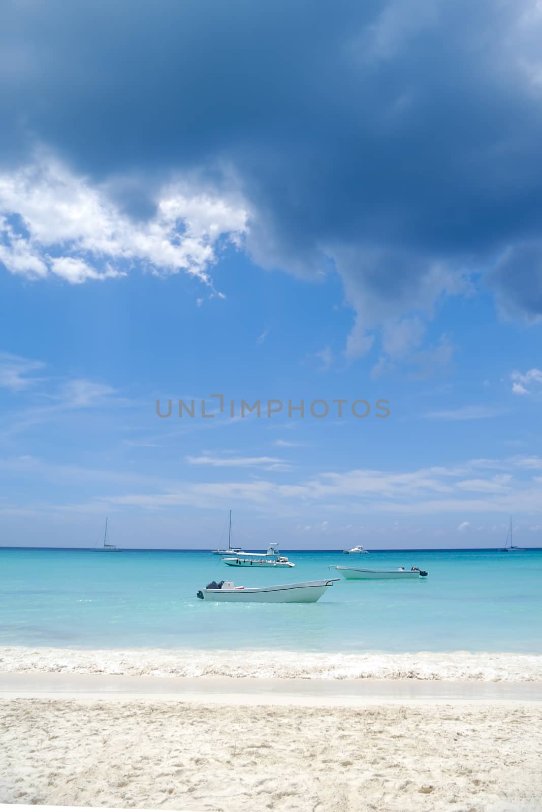 Boats and exotic beach at Saona Island, The Dominican Republic