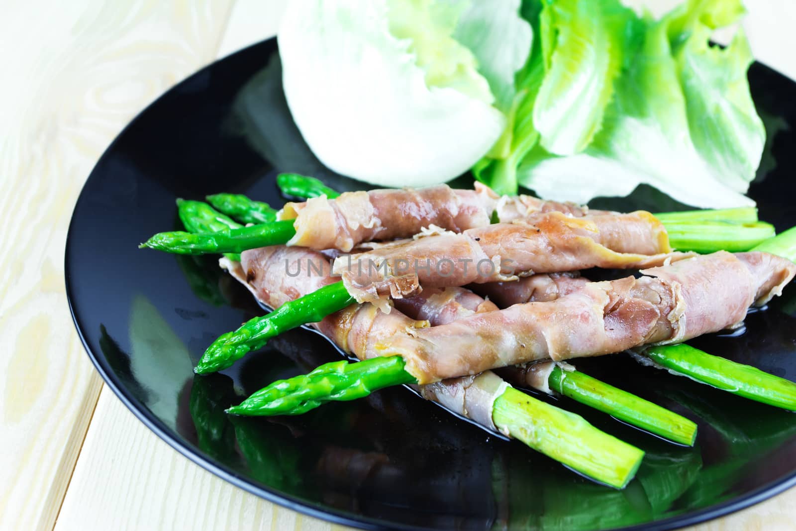 Grilled asparagus with Parma ham  by wyoosumran