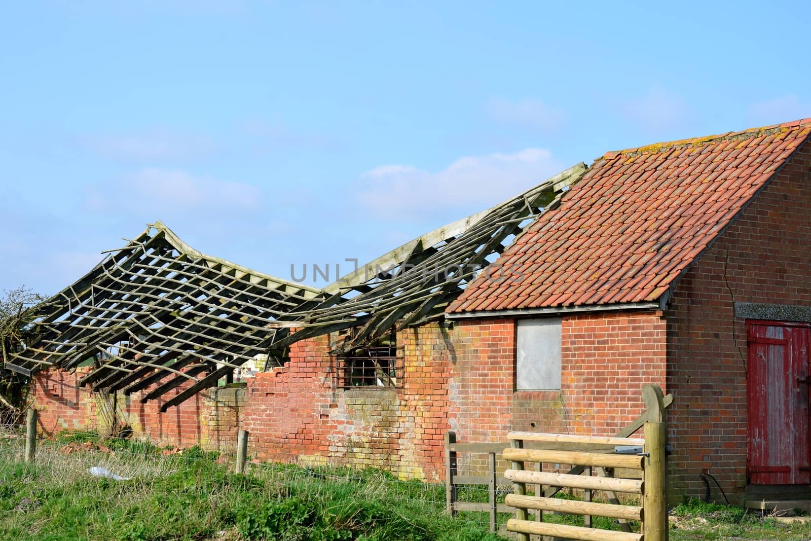 Collapsed roof and barn