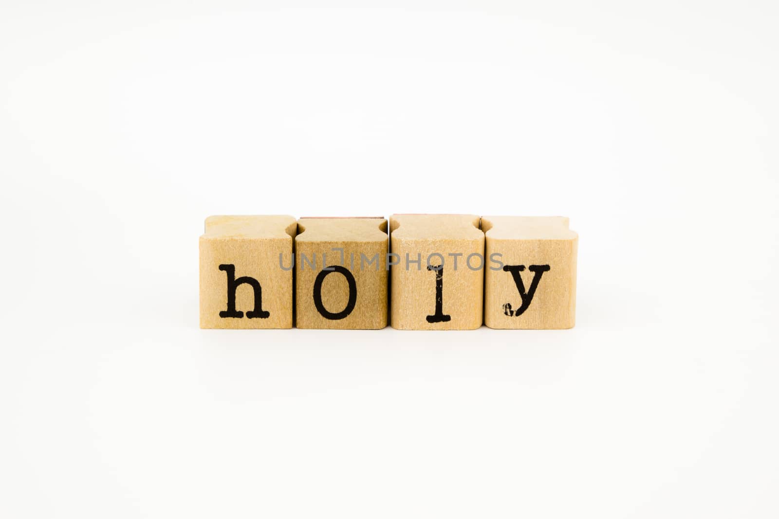 closeup holy wording isolate on white background