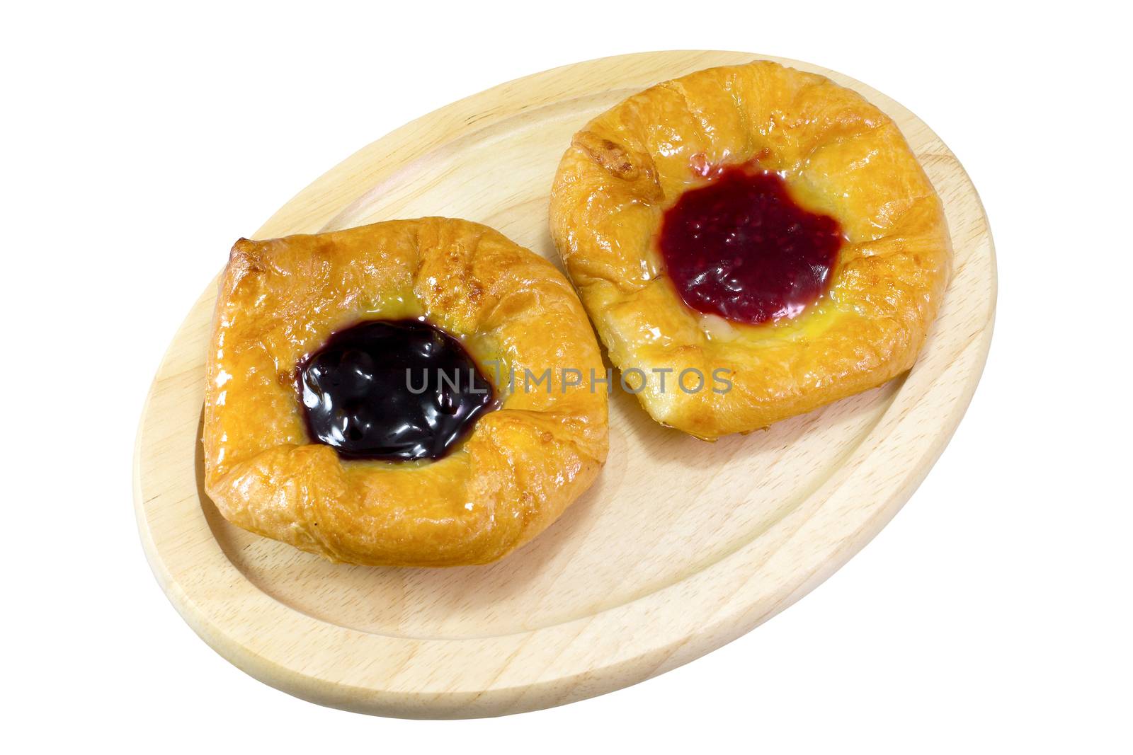 danish pastry with strawberries jam , blueberries jam on white background