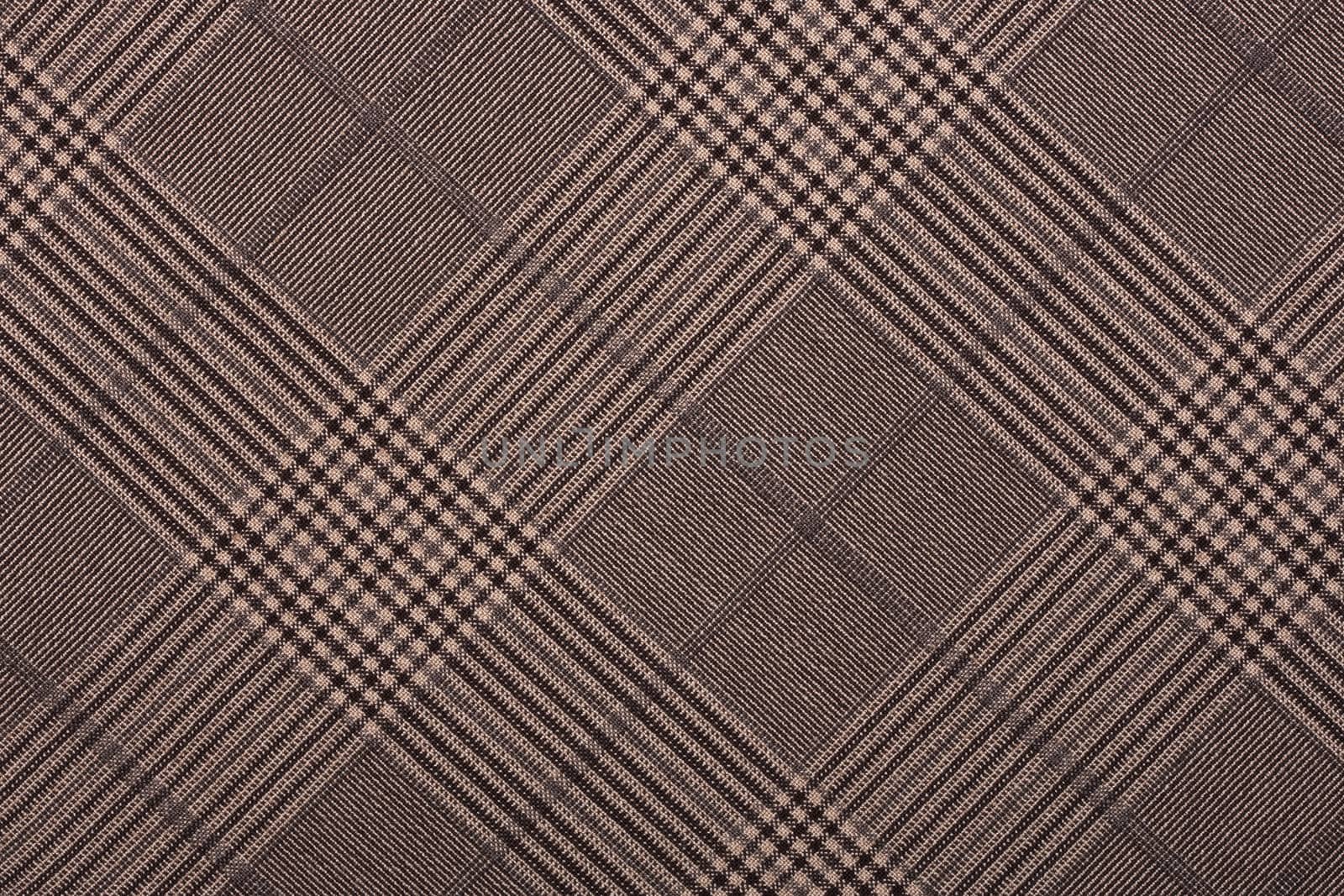 Brown material in geometric patterns, a background or texture