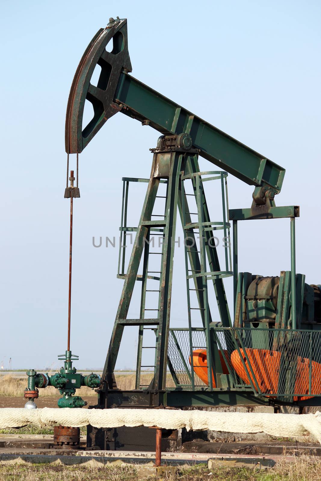pump jack close up oil industry by goce