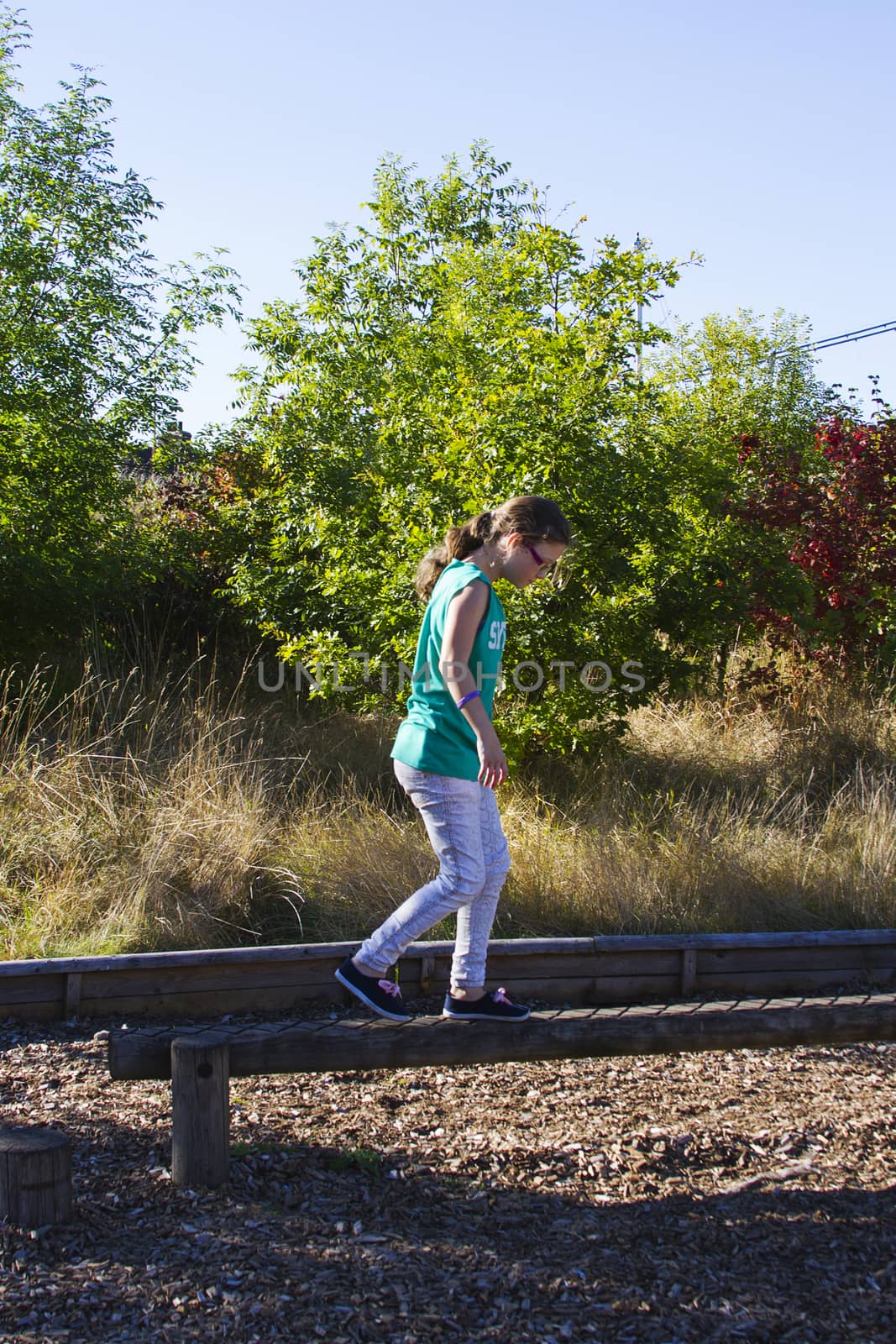 Young girl on balance beam