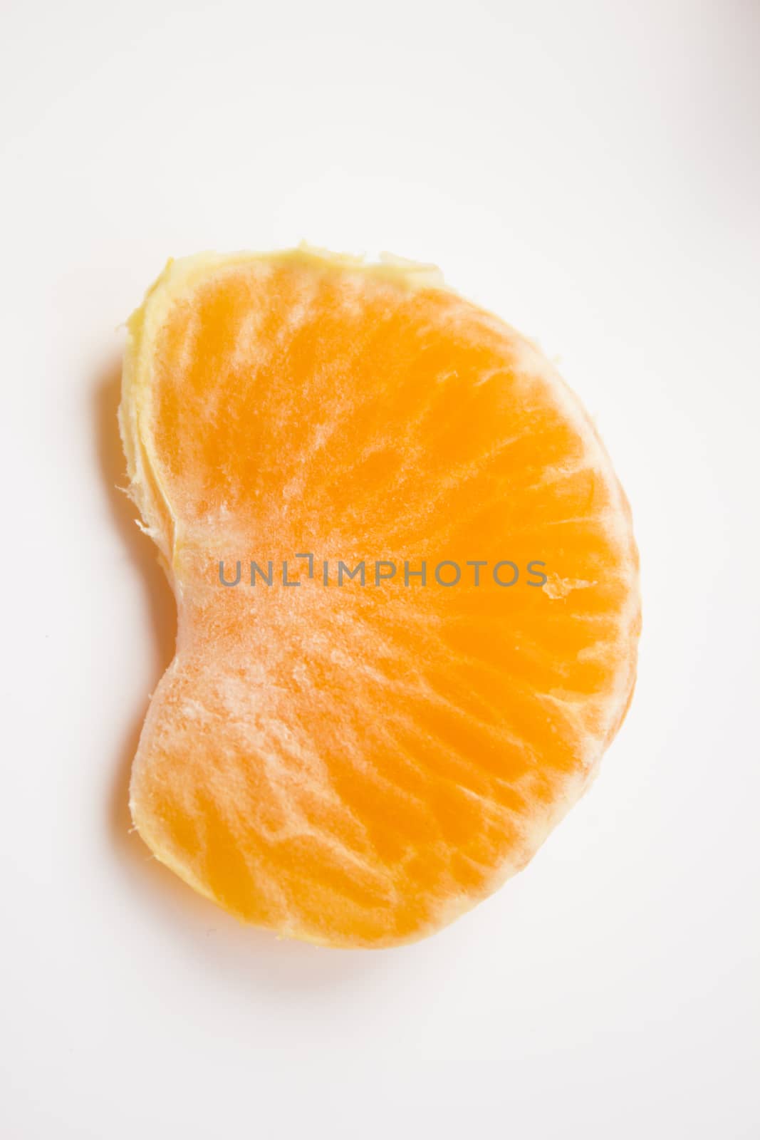 Vibrant mandarin fruit on a white background.