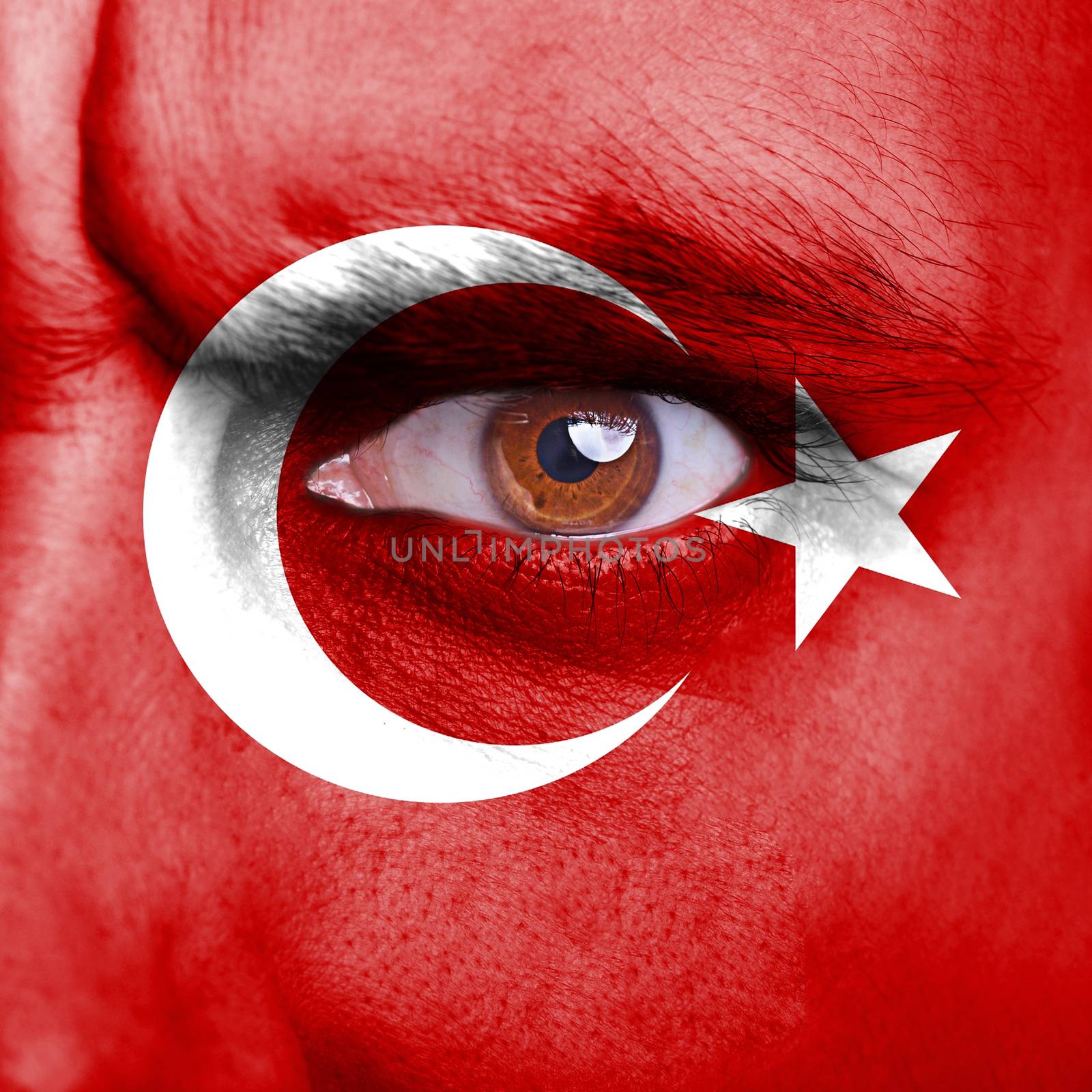 Turkey flag painted on angry man face