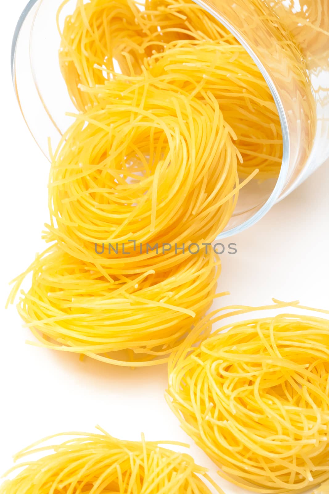 pasta in glass jar on a white background