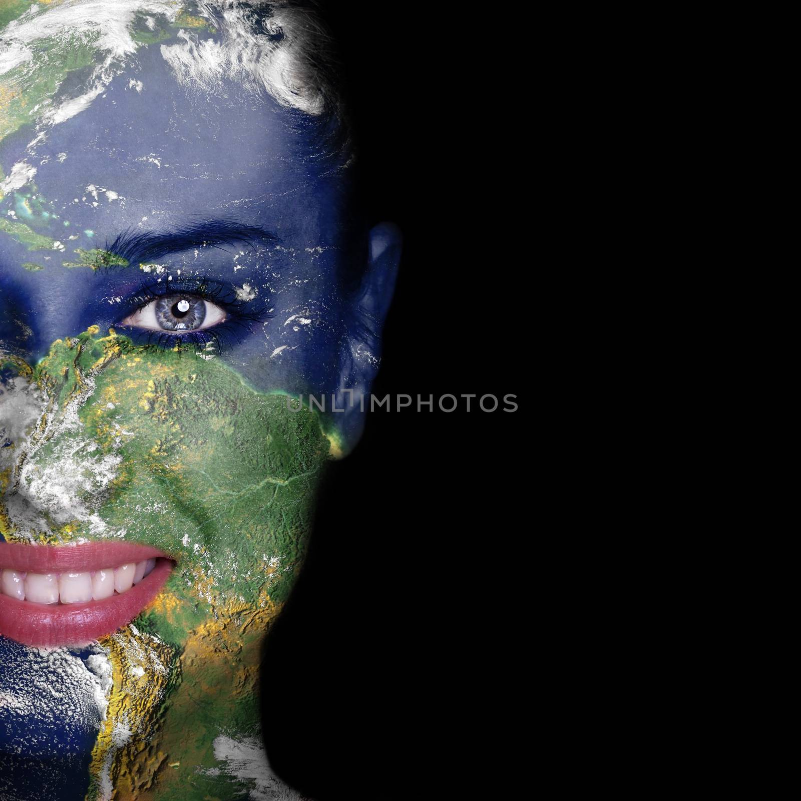 Nature concept -woman face covered with earth photo