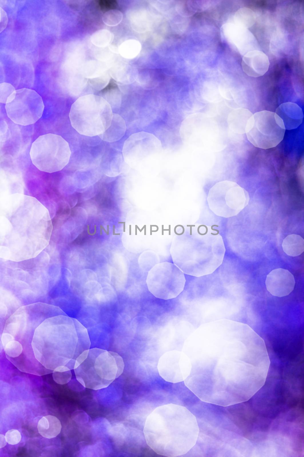 Purple defocused abstract background with bokeh circles