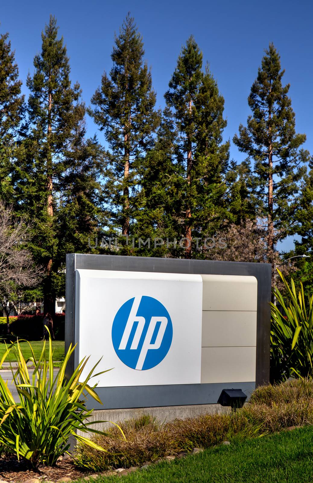 PALO ALTO, CA/USA - MARCH 16, 2014: Hewlett-Packard corporate headquarters in Silicon Valley. HP is an American multinational information technology corporation that provides hardware, software and services to consumers, businesses and government.