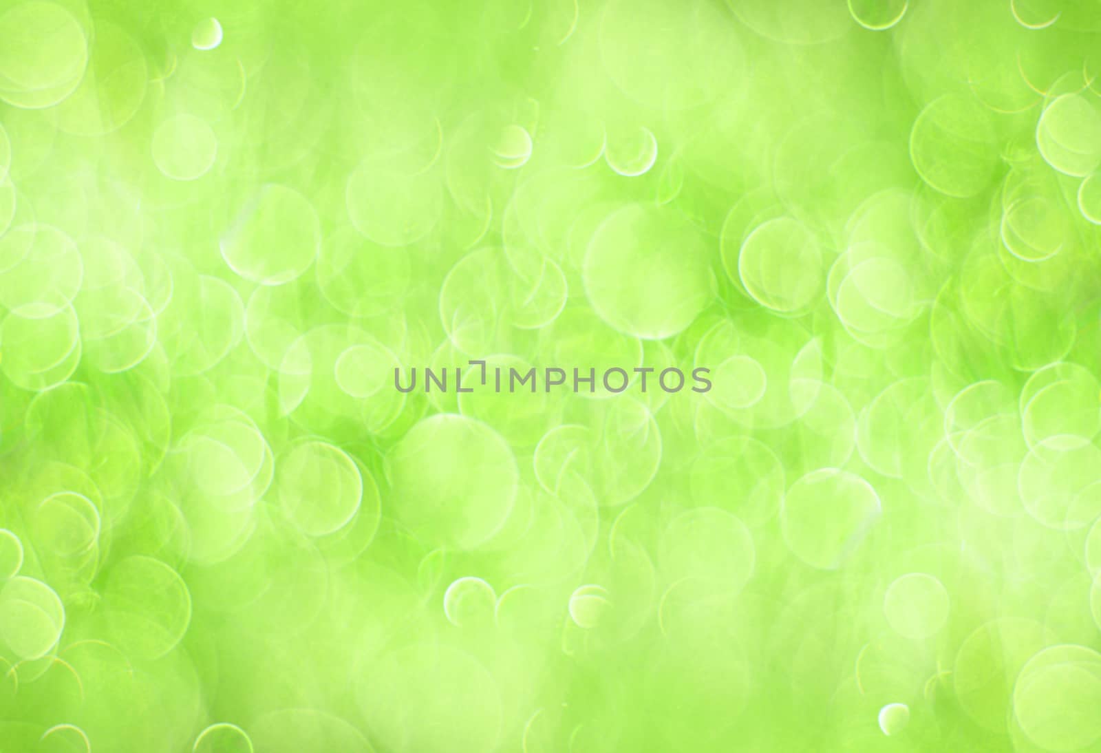 Green abstract background with bokeh circles