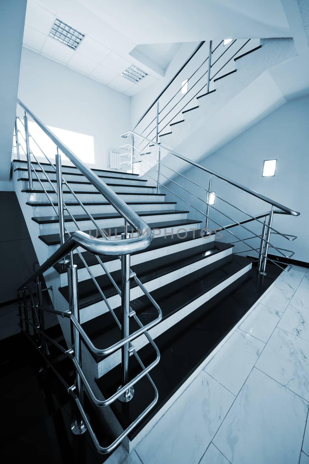 staircase with a steel handrail by terex