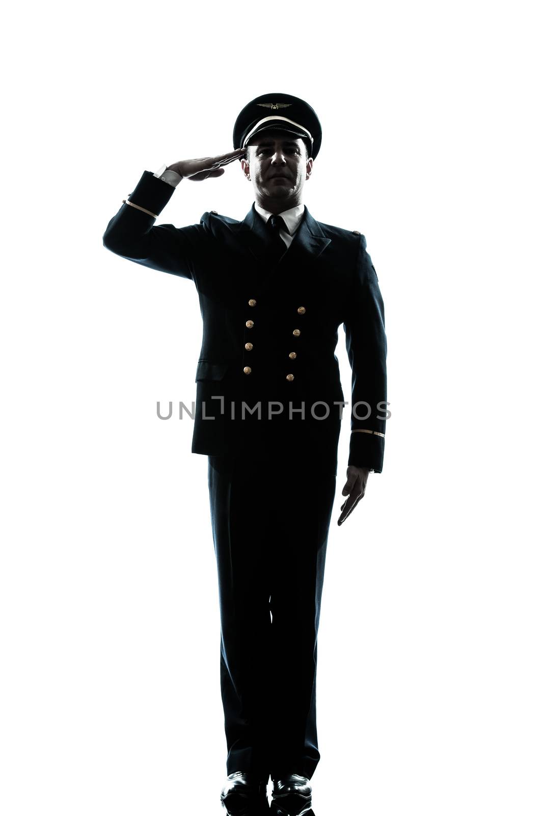 one caucasian man in airline pilot uniform saluting silhouette in studio isolated on white background