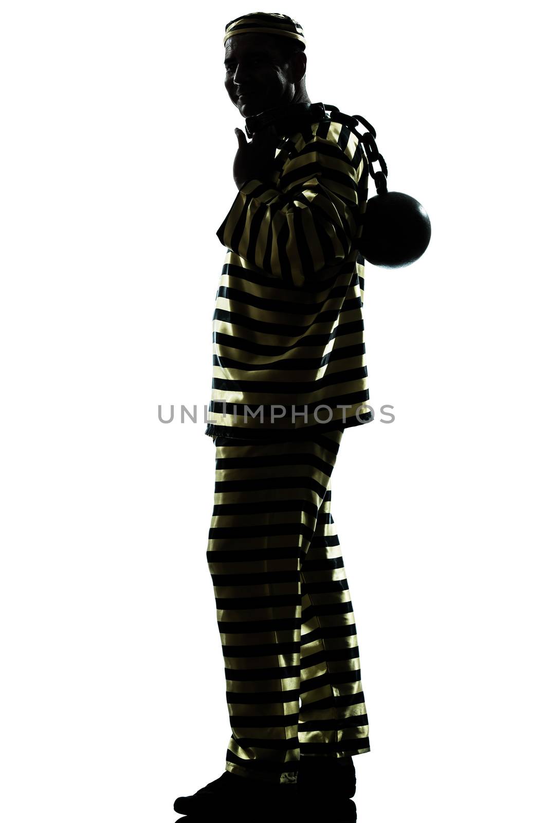 one caucasian man prisoner criminal escaping with chain ball silhouette in studio isolated on white background