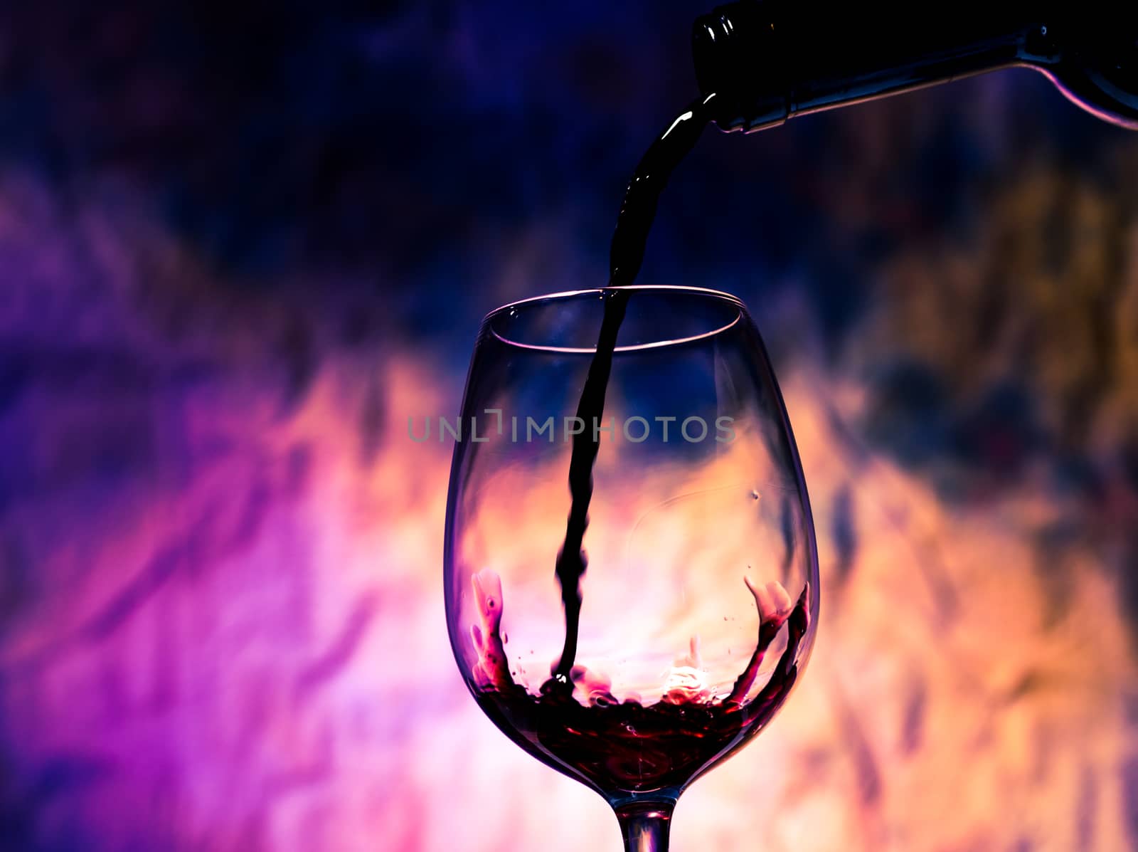 Red Wine Poured into Wineglass by Discovod