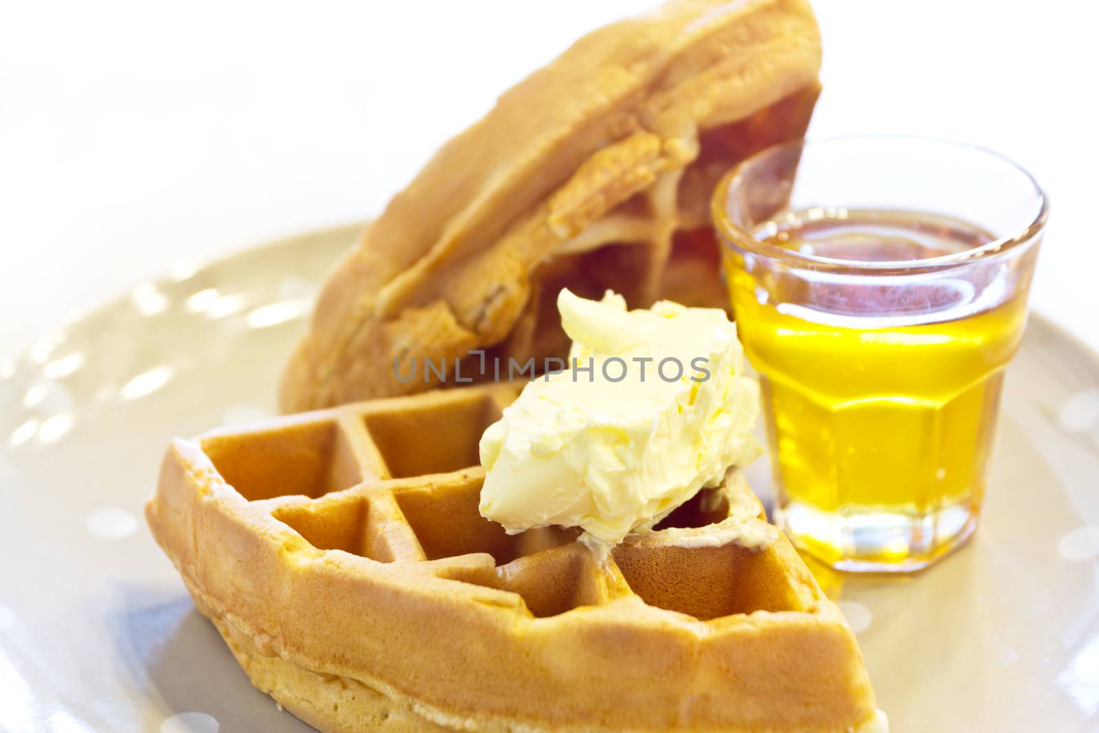 Tradition waffle with butter  by wyoosumran
