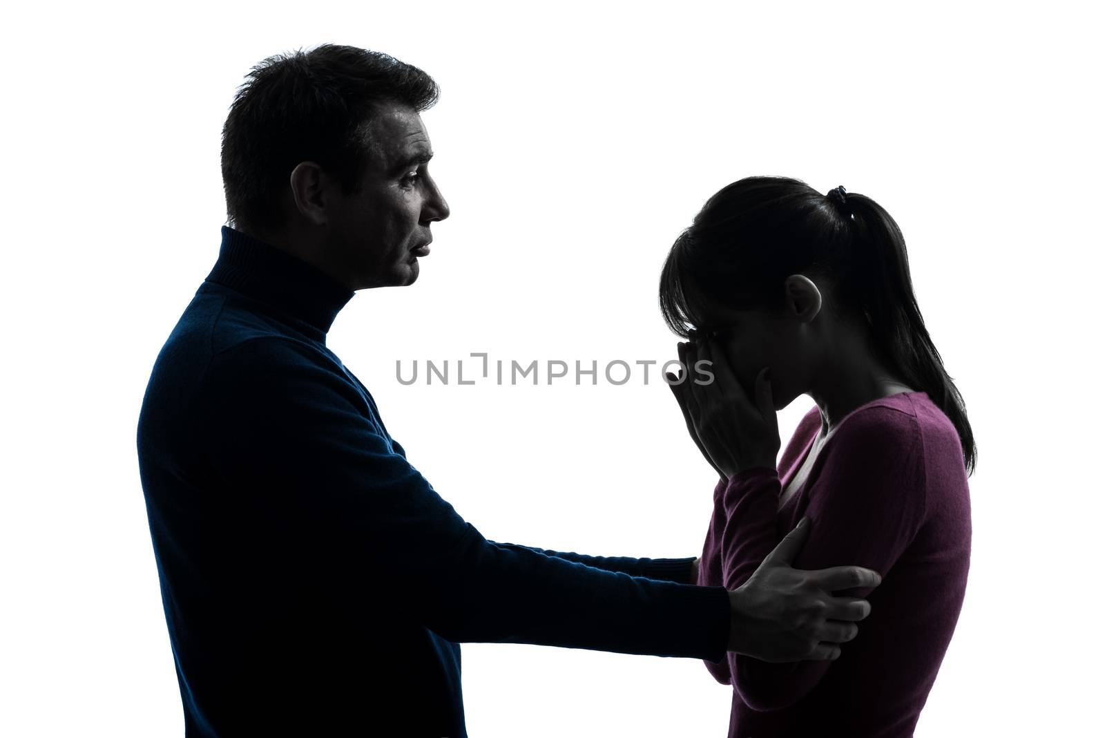 one caucasian couple woman crying man consoling in silhouette studio isolated on white background