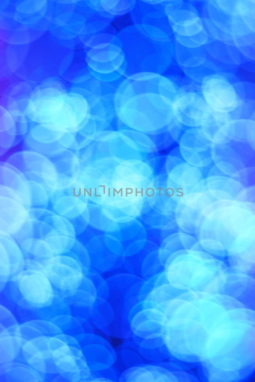 Blue abstract background with bokeh circles