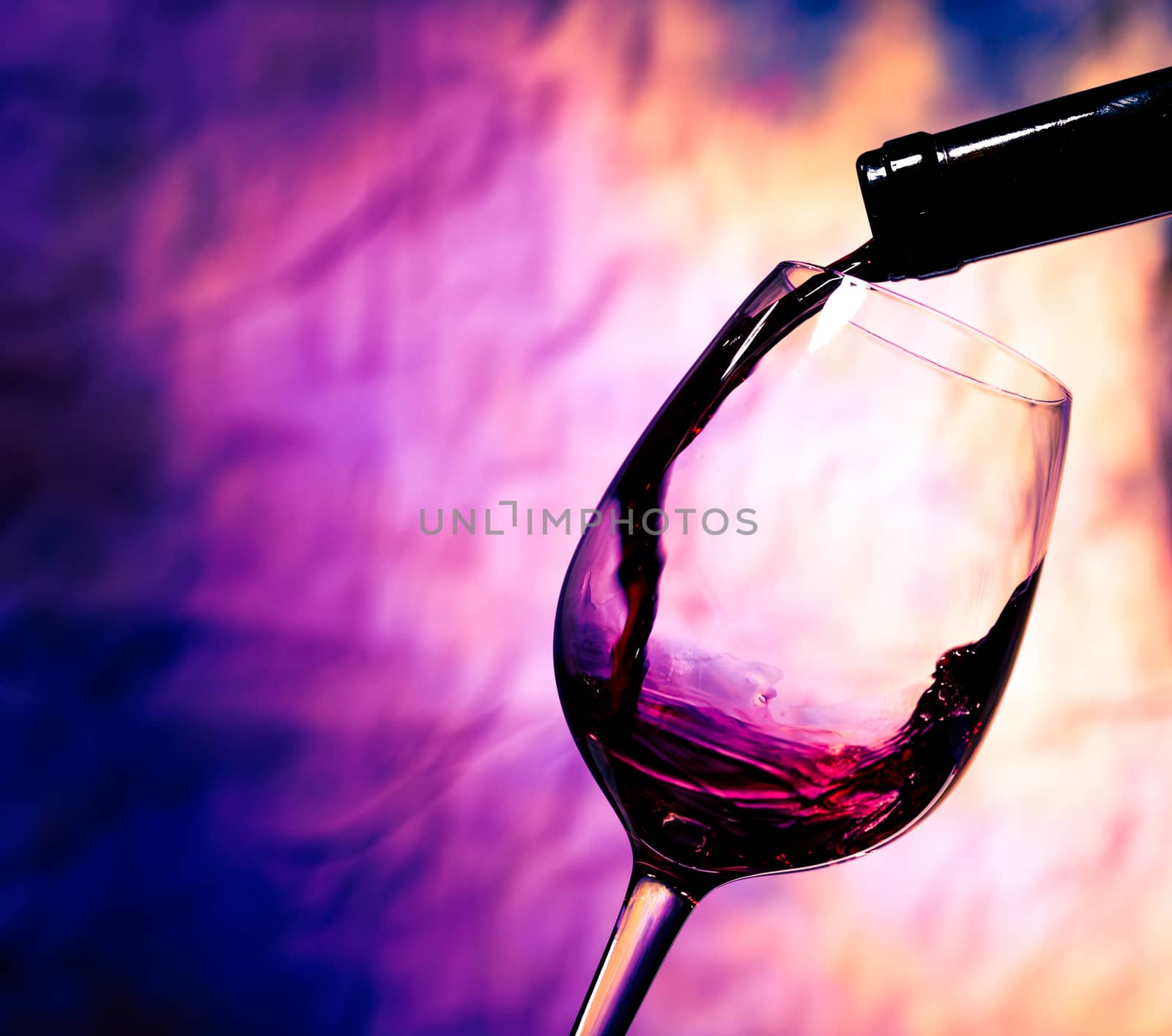 Red Wine Poured into Wineglass by Discovod