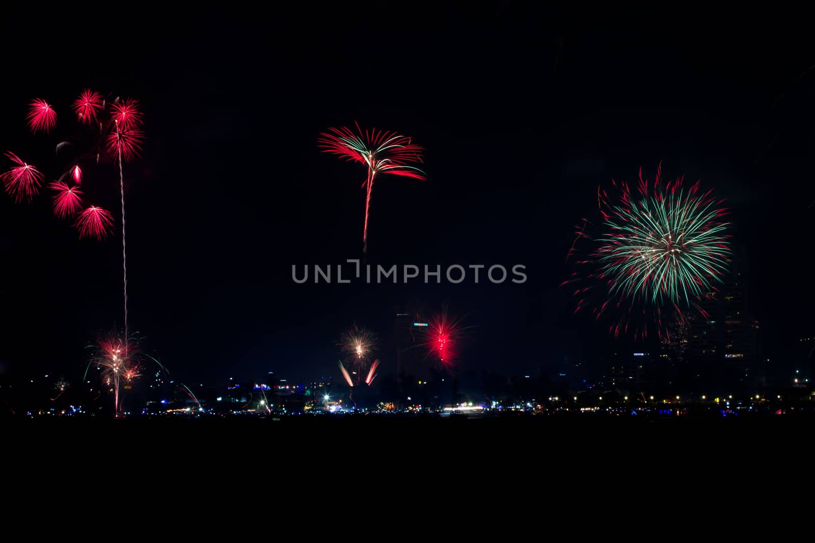 Fireworks over Patong City, South of Thailand on the feast of "New Year", View from the Sea
