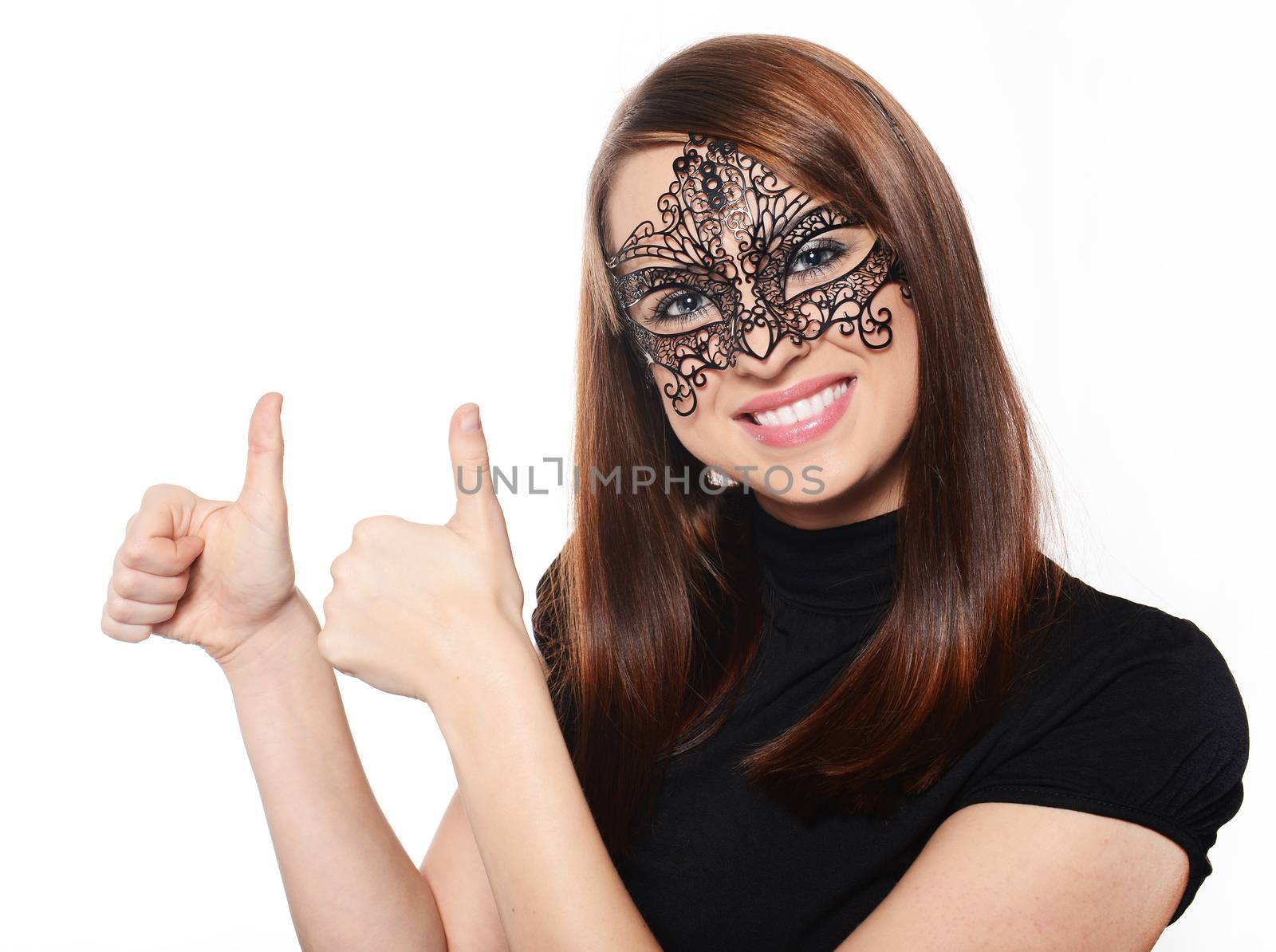Beautiful woman in carnival mask over white background