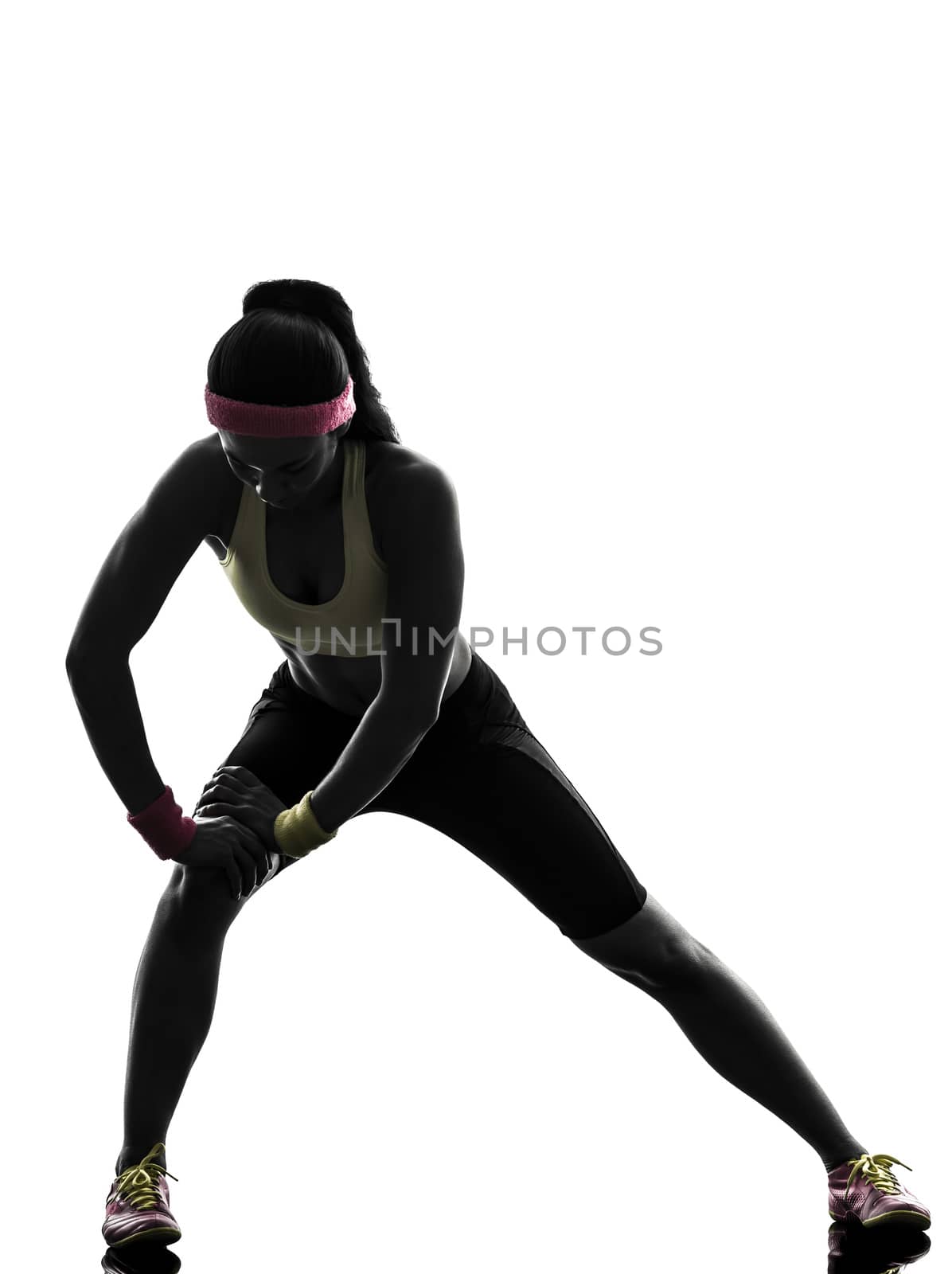 one woman exercising fitness workout in silhouette on white background