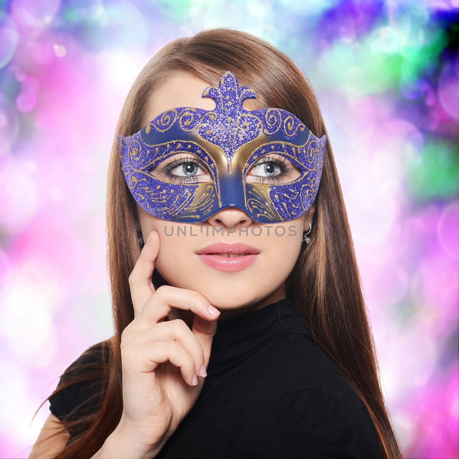 Beautiful caucasian brunette in red carnival mask over white background