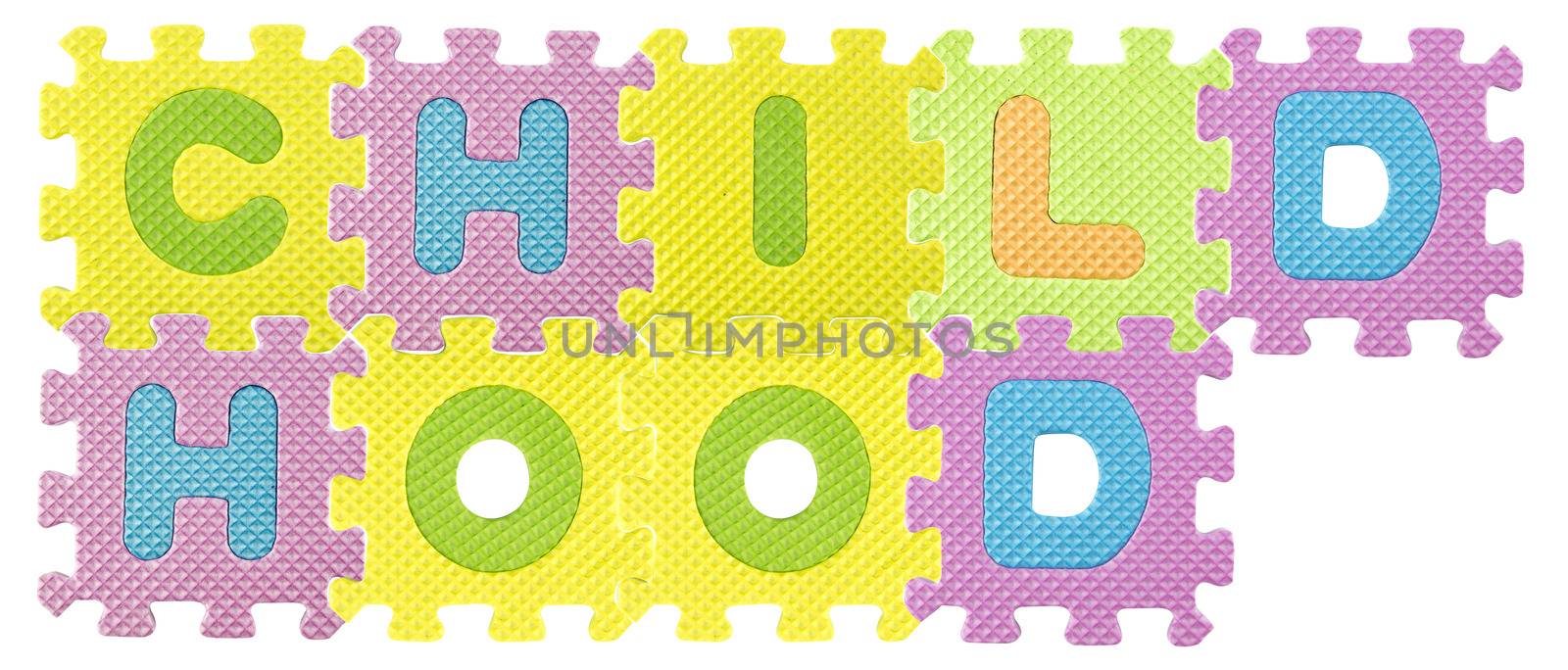 Childhood word created from Alphabet puzzle isloated on white background , with clipping path.