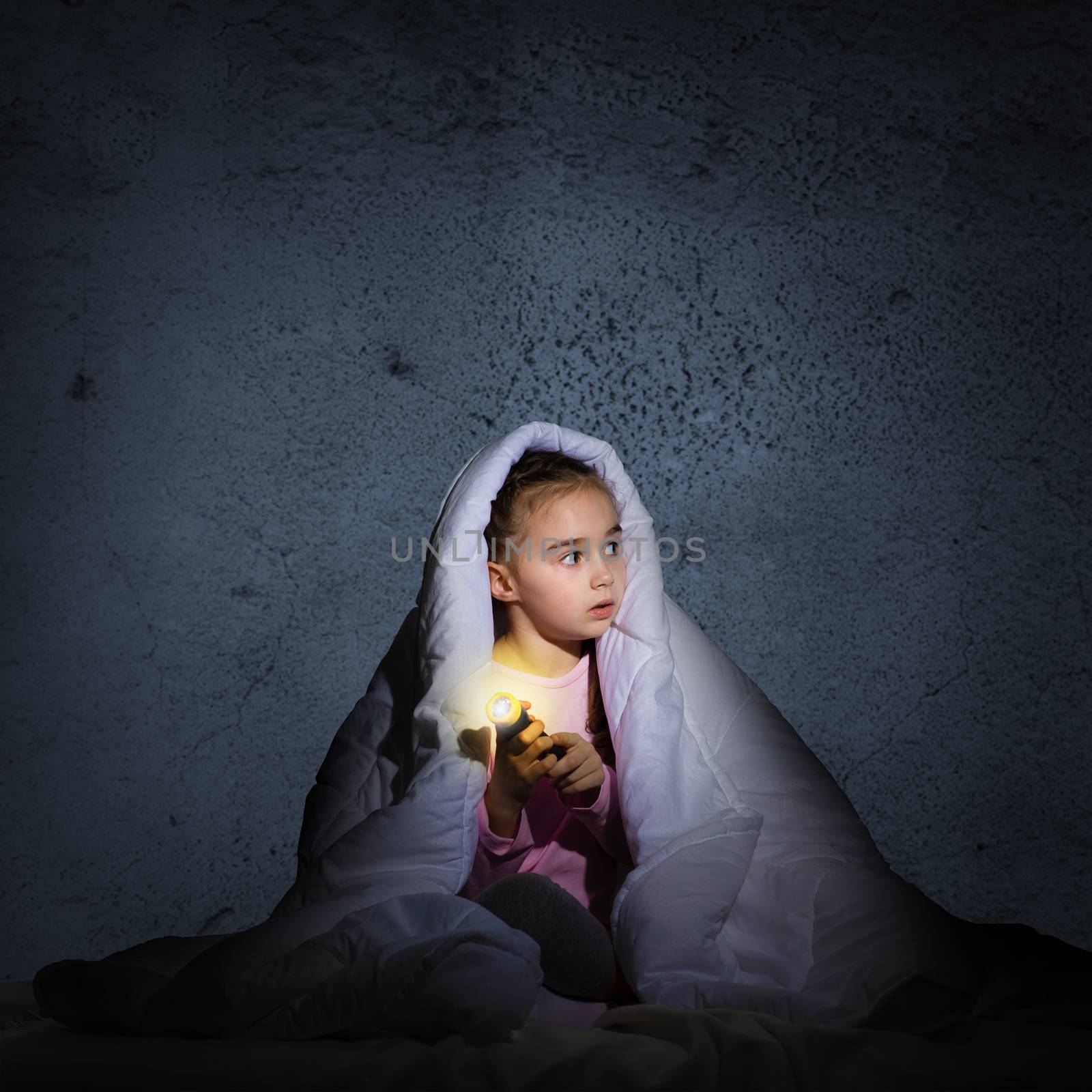 girl under the covers with a flashlight by adam121