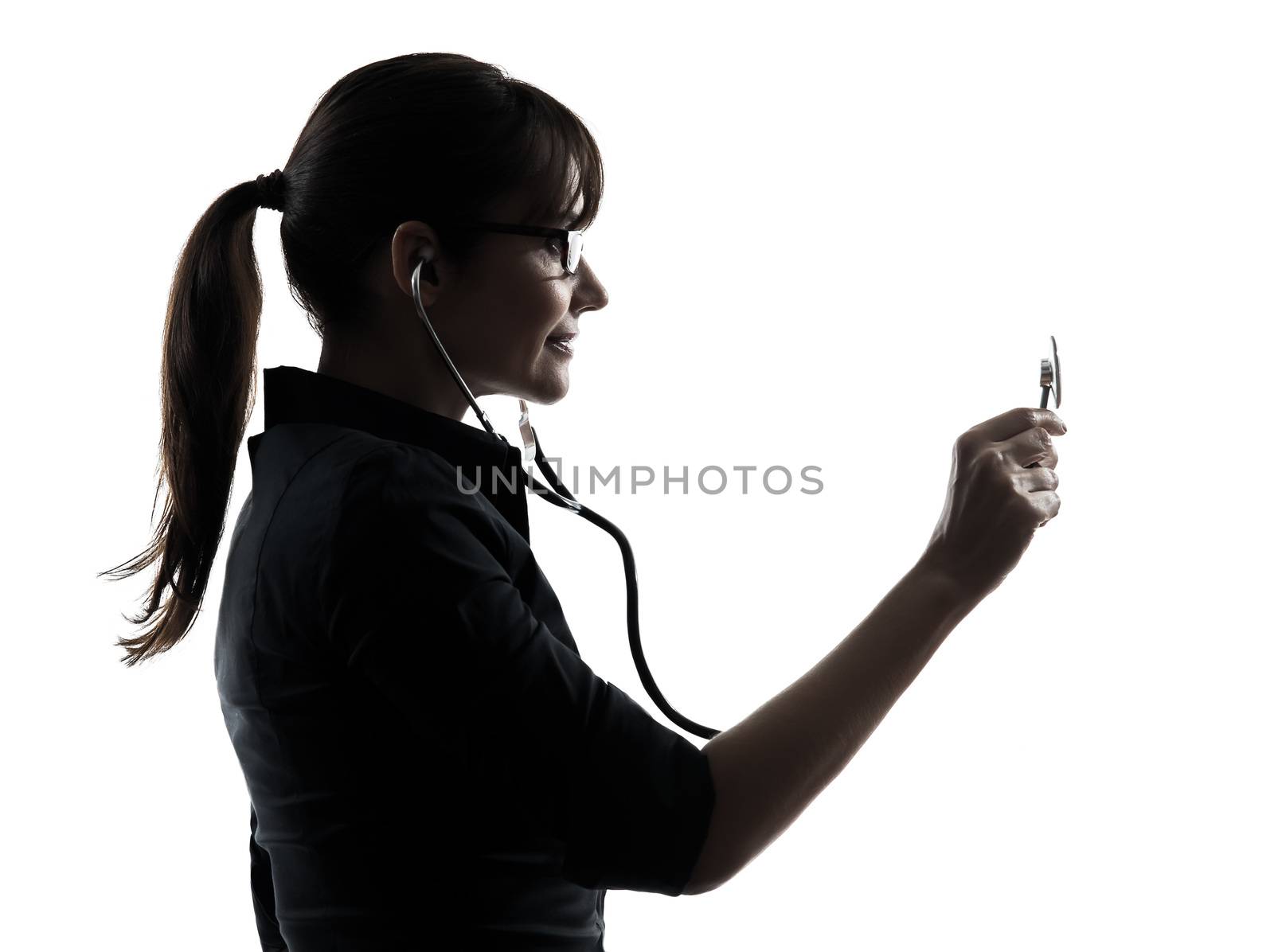 woman doctor holding stethoscope silhouette by PIXSTILL