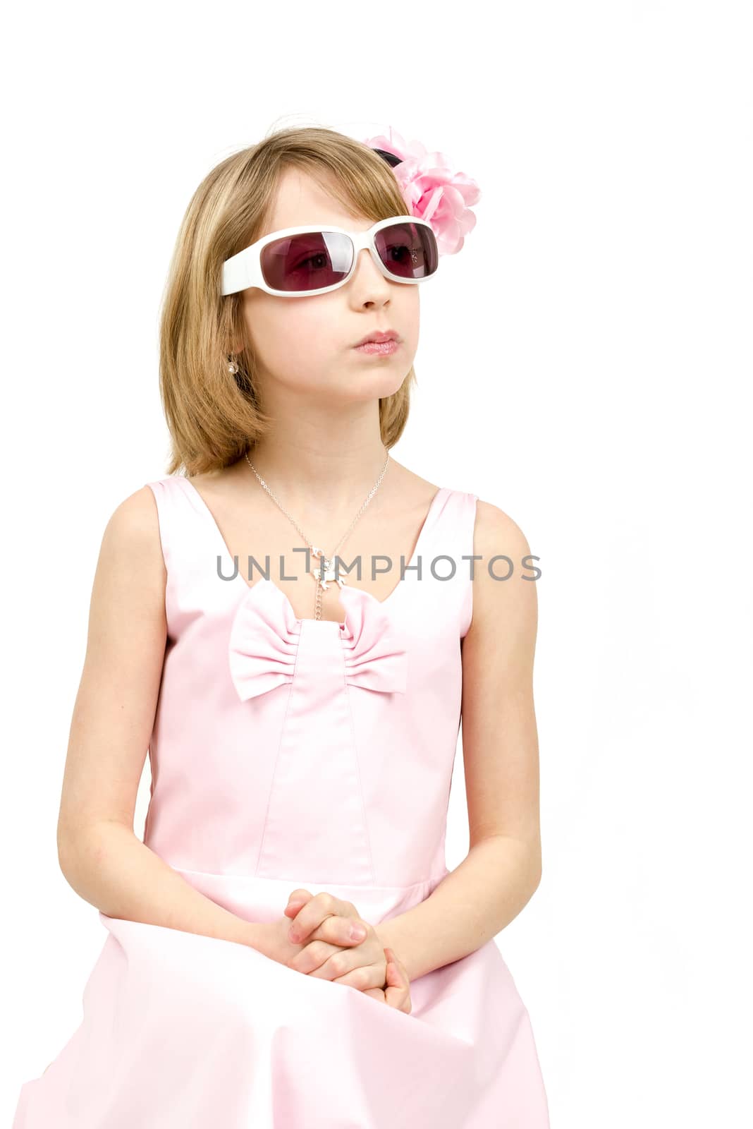 Studio portrait of young beautiful girl with sun eyeglasses on white background