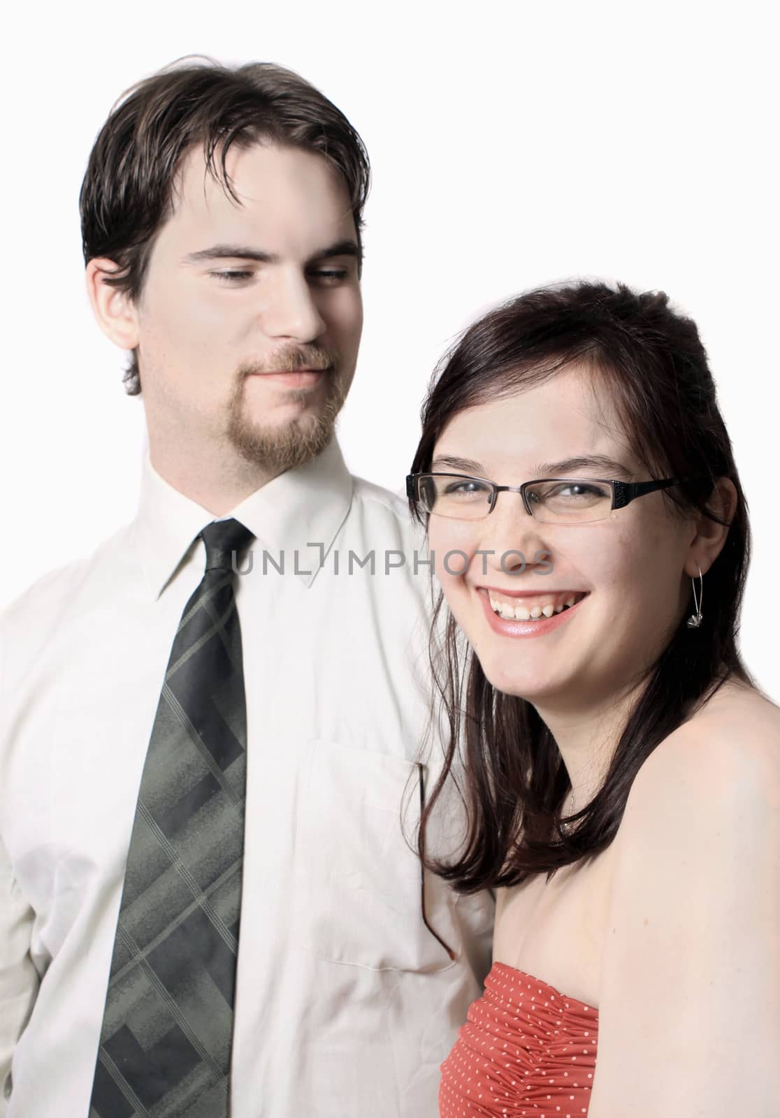 Cute young couple happy together on a white background