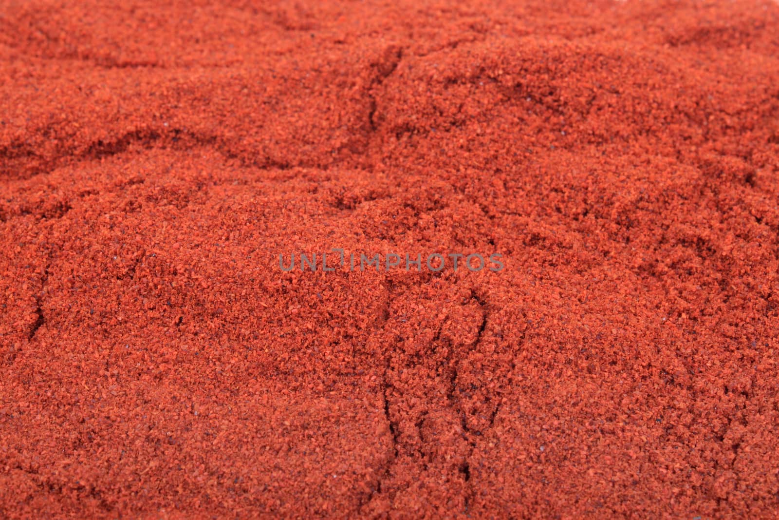 Close up of vibrant rusty colored paprika spice 