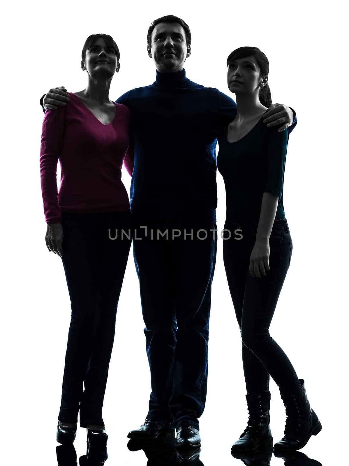 one caucasian family father mother daughter standing full length looking up in silhouette studio isolated on white background