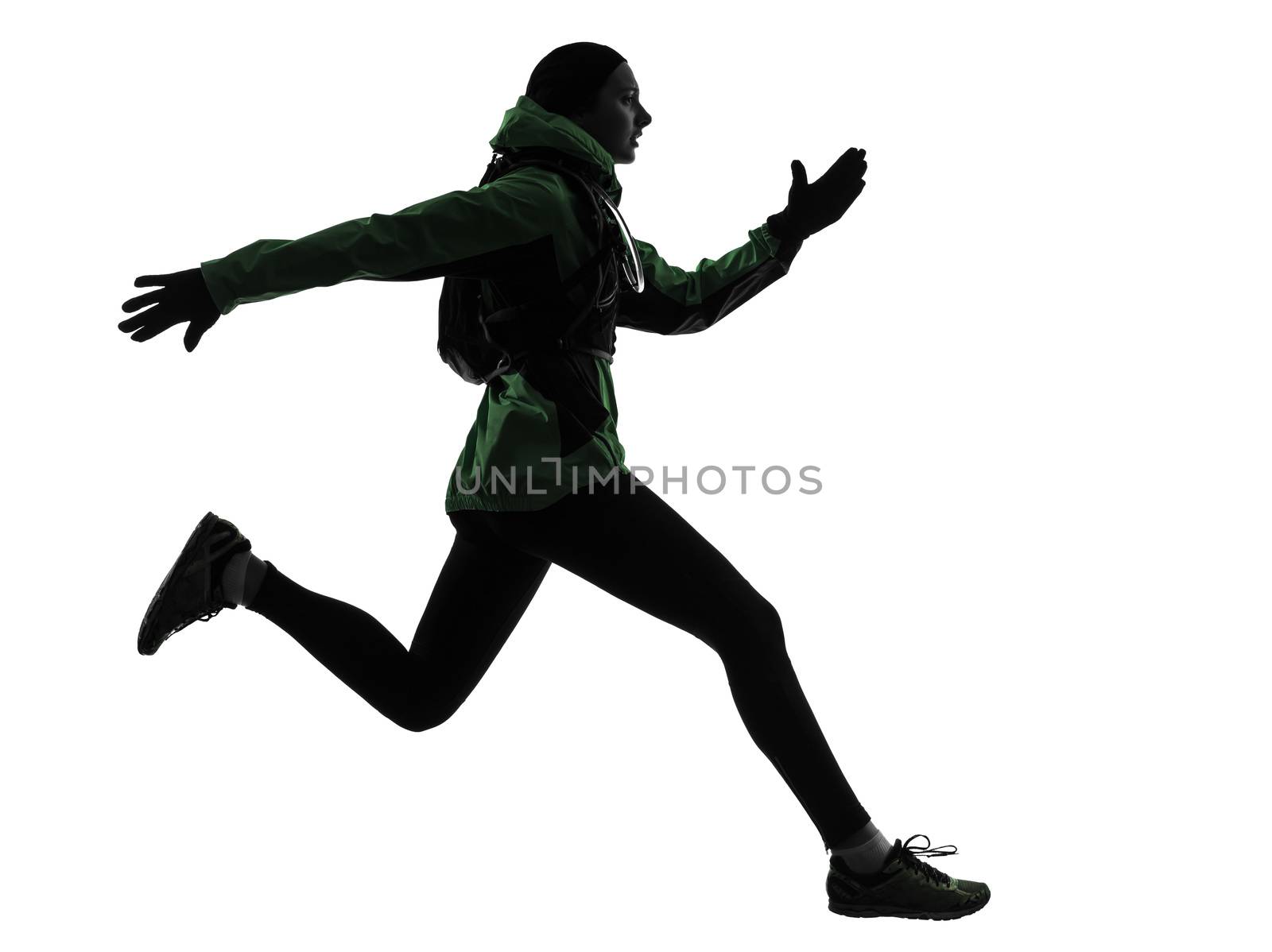 one caucasian woman runner running trekking in silhouette studio isolated on white background