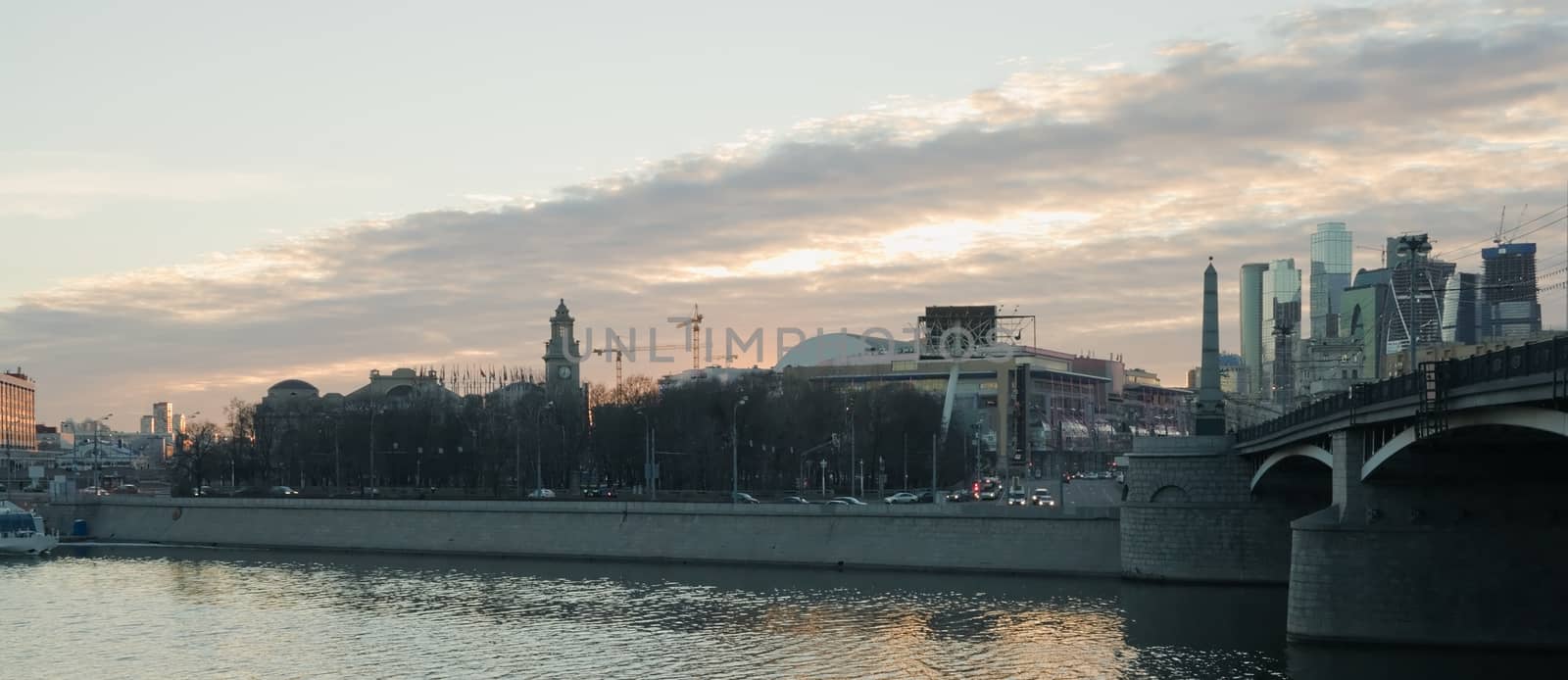 Moscow at sunset. View of the embankment  Berezhkovskaya and the Kiev railway station.
