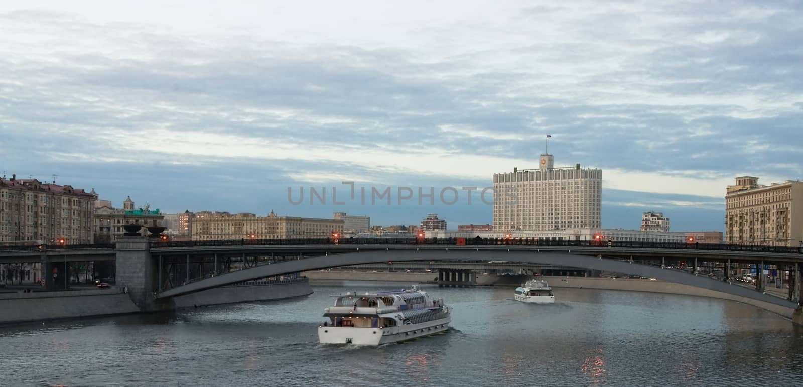  View of the building Government of the Russian Federation in Moscow by the Moscow river in twilight