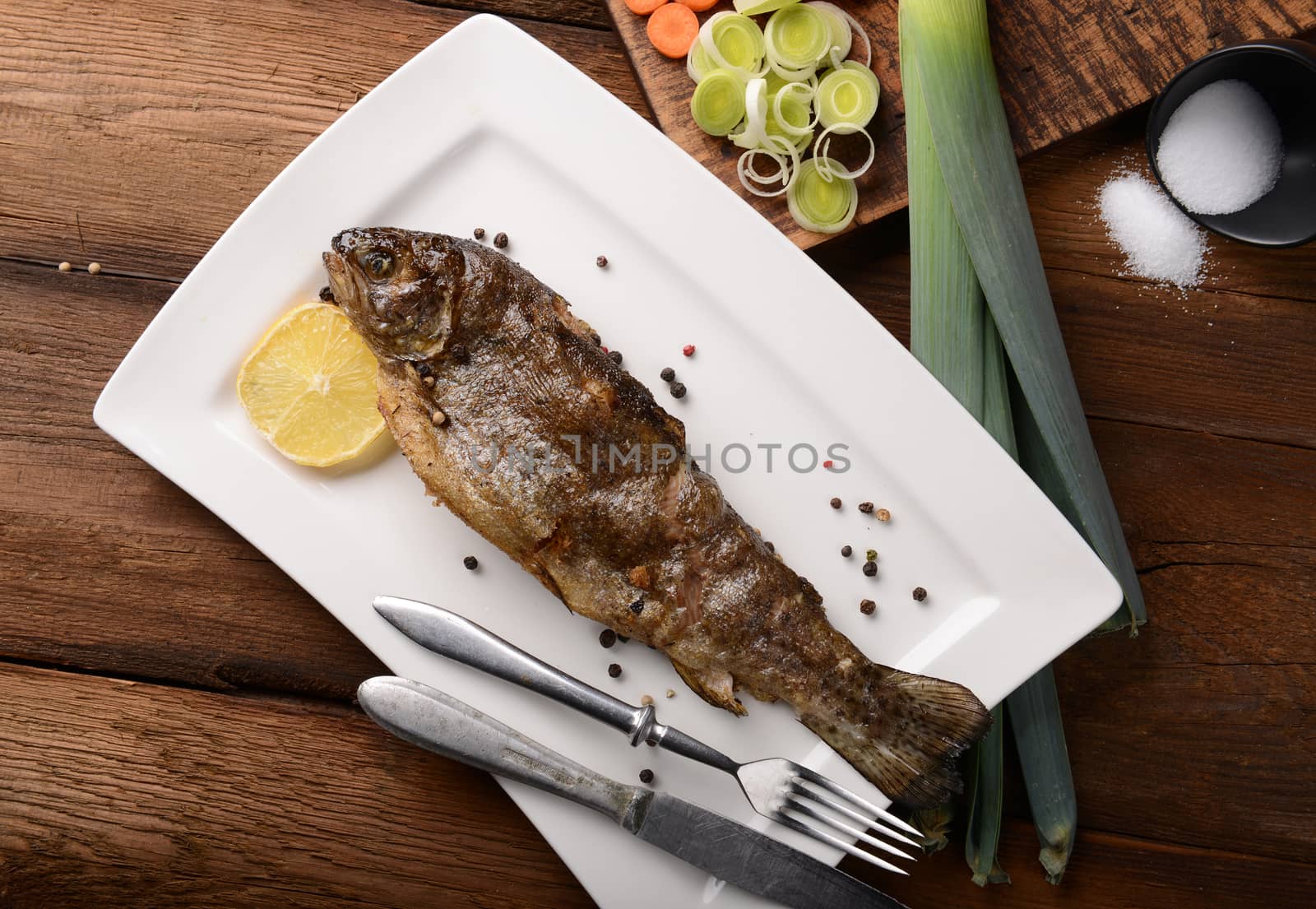 Fresh trout on wooden background