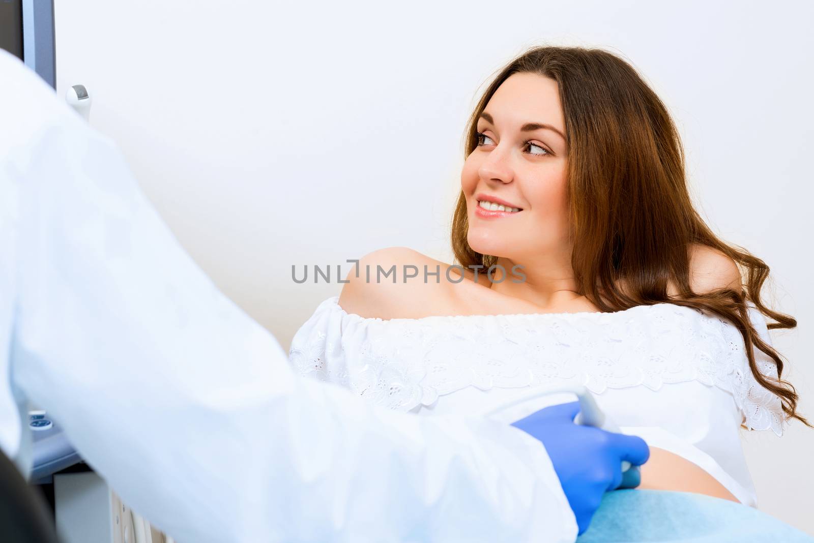 pregnant woman on reception at the doctor by adam121