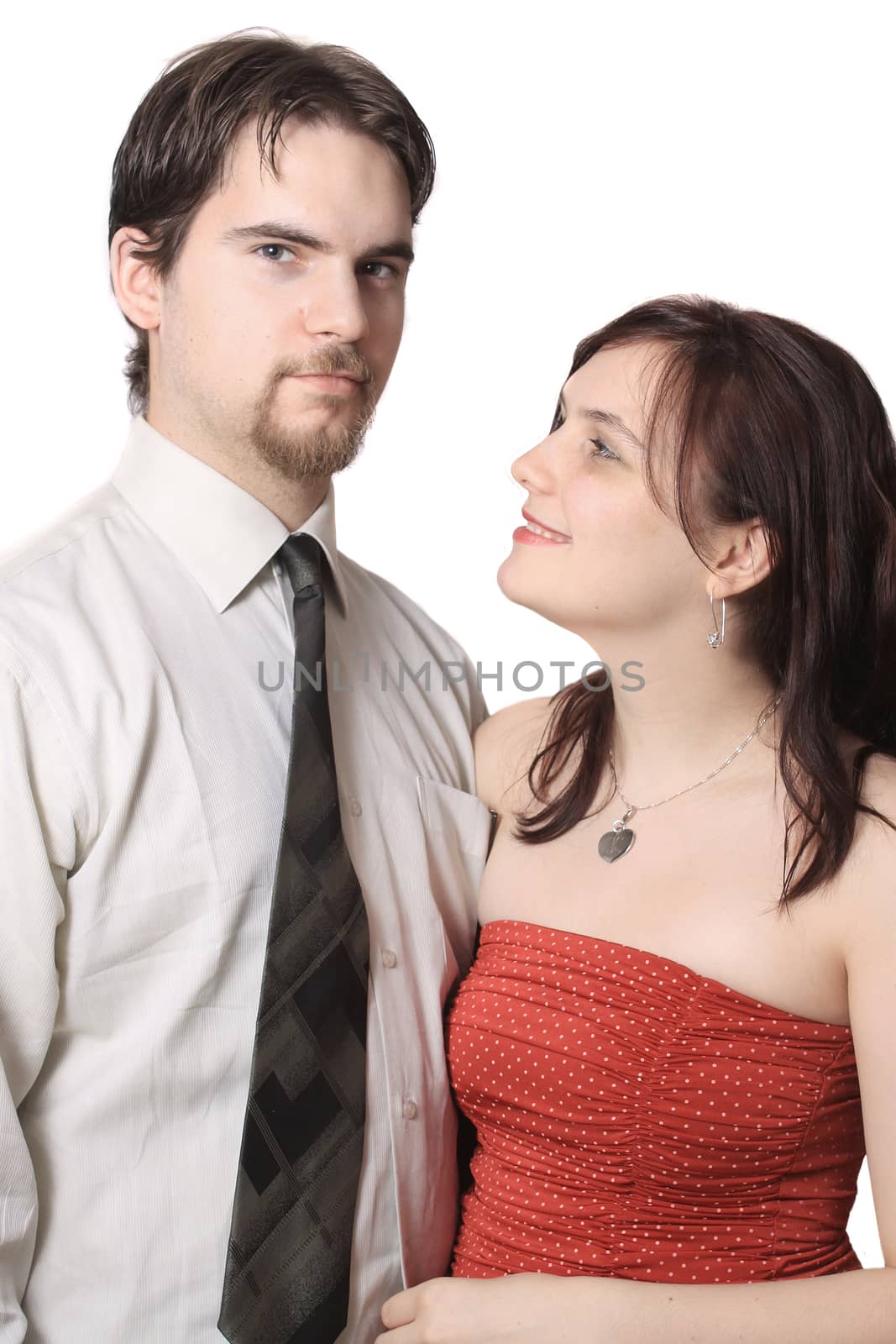 Cute young couple happy together on a white background