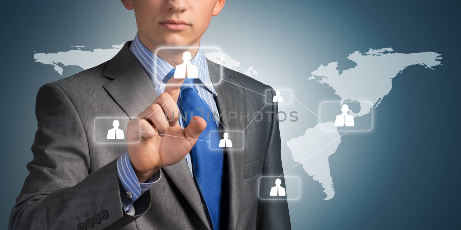 businessman pushing social network on the symbols on the touch screen