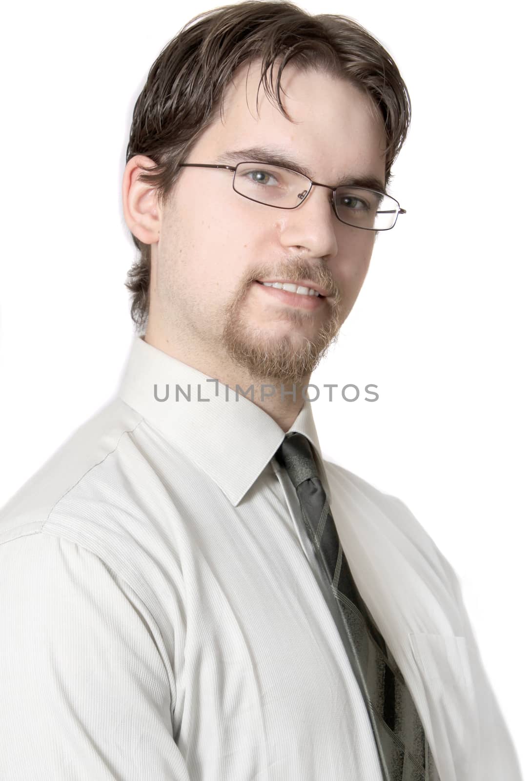 Handsome young executive with glasses on a white background