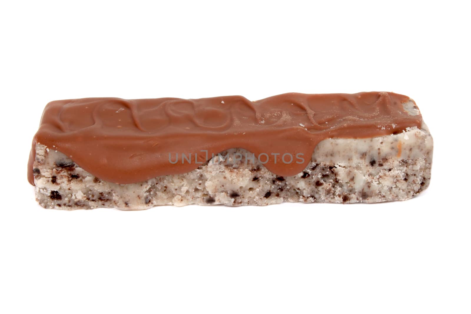 Cookie crumbel fudge bar drizzled with chocolate on a white background