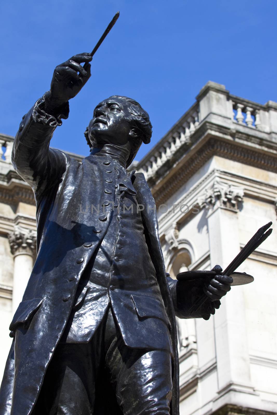 Statue of English painter Joshua Reynolds situated at Burlington House which houses the Royal Academy of the Arts in London.