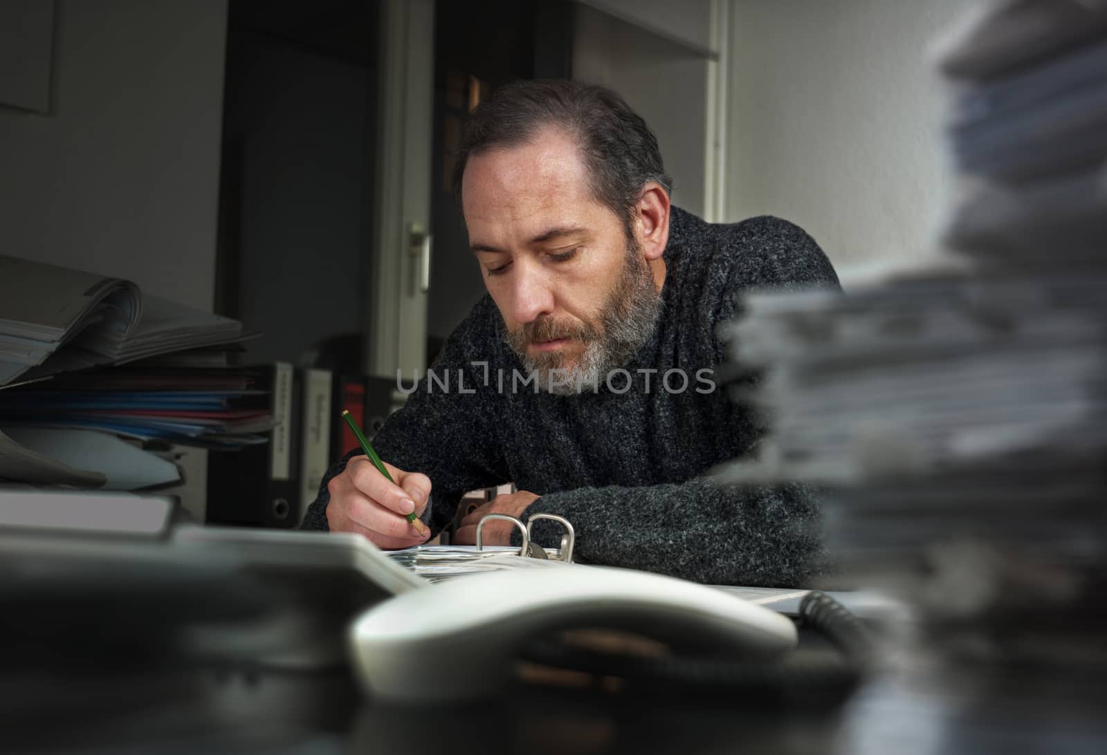 Businessman writing on papers by aa-w