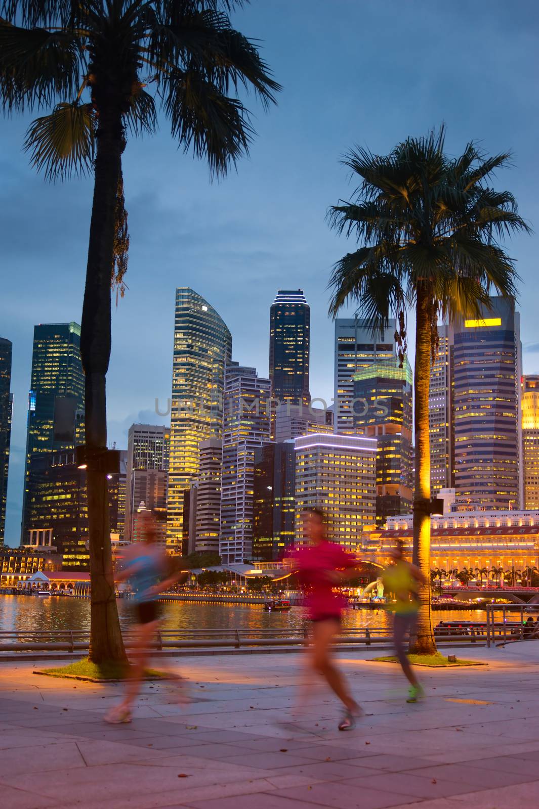 Singapore night life, people jogging in downtown