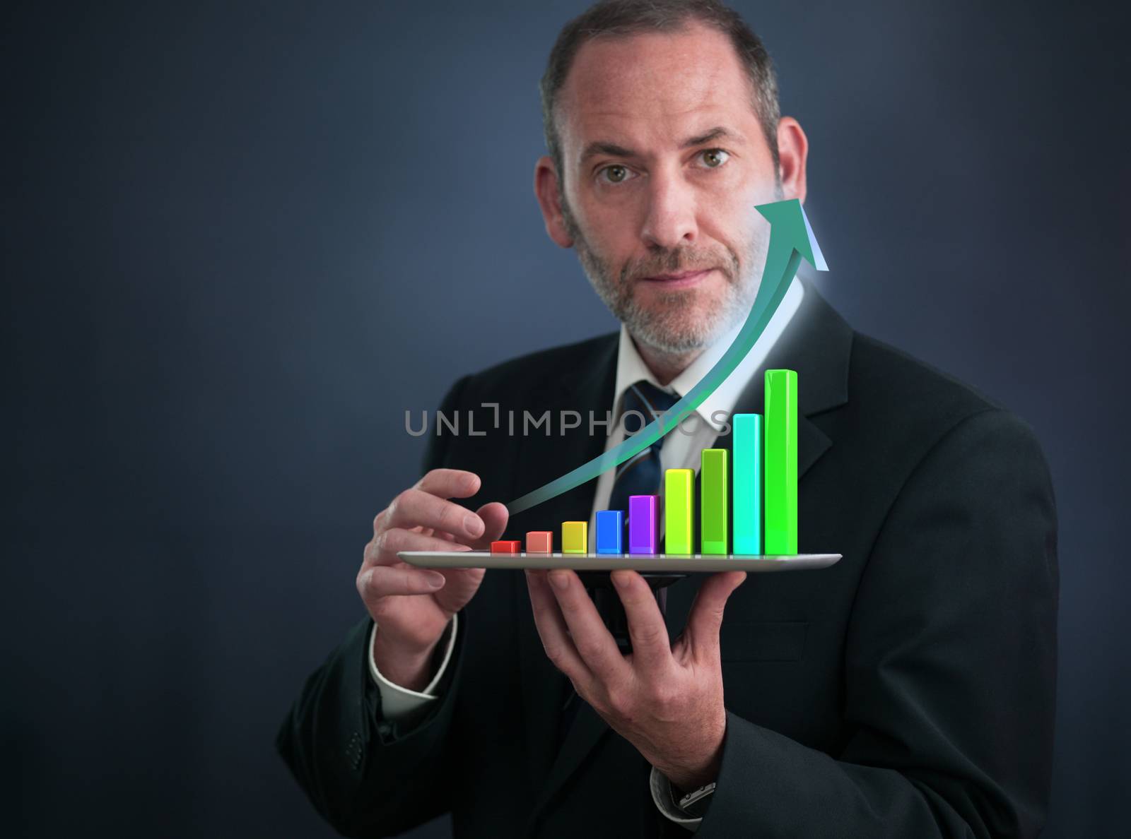 Businessman with Tablet Pc shows an analysis tool graph